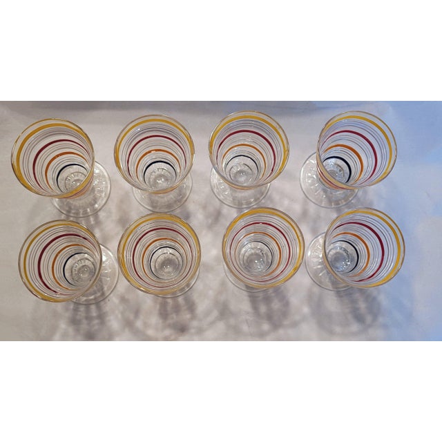 Wow! These are 1930's happy glasses. During the depression it was hard to sell specialty glassware, but if they were...