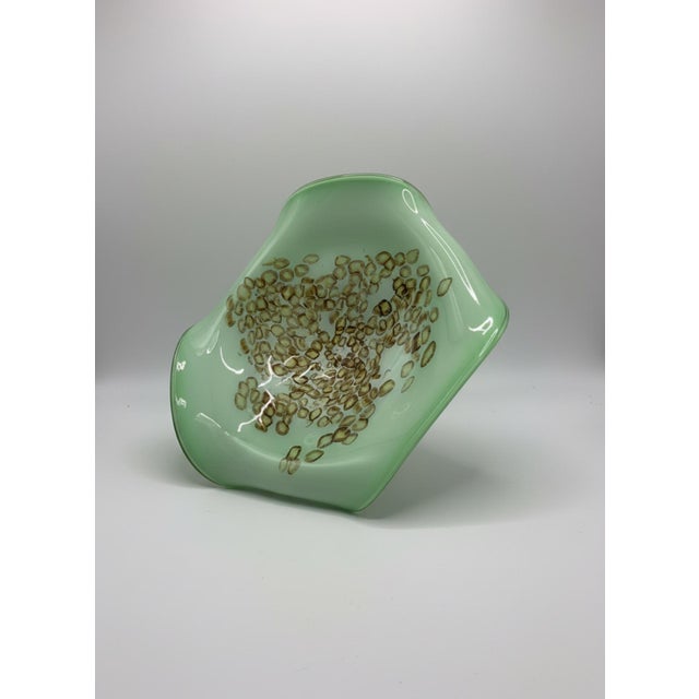An absolute showstopper for the discerning modernist collector, this exhibition-scale mid-century Murano glass console...