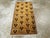 This Mid-20th century Turkish Art Deco throw rug, measuring 1' 8" x 3' 0", is a striking example of modernist influence...