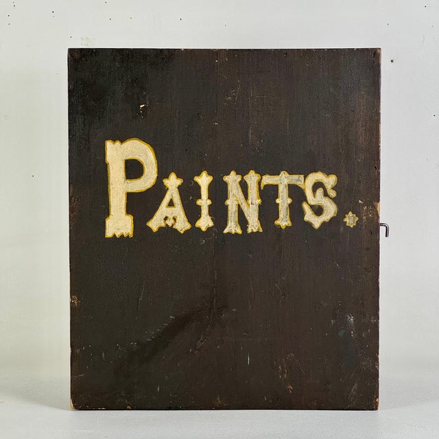 A stupendous piece of 19th Century tradesman's wooden cupboard box. It's one used-by and customized for a painter. Right...