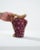 A ceramic pitcher from France, produced circa 1960. This sculpted pitcher is modeled into the distinctive shape of a grape...