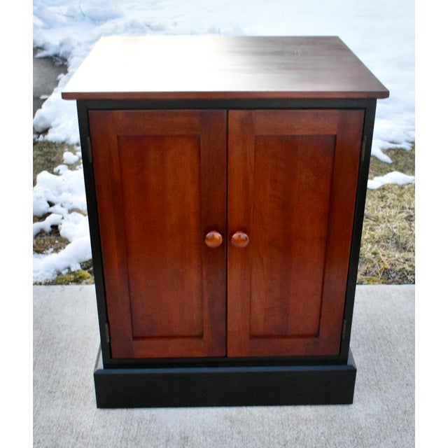 Vintage (1990's) Cabinet has a Transitional Style. Made by Ethan Allen. The Wood is Cherrywood. The Finish is Two Toned...