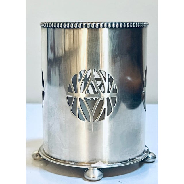 Elegant antique footed container in silver plate, by England's Israel Freeman & Sons Ltd., featuring gorgeous stylized cut...