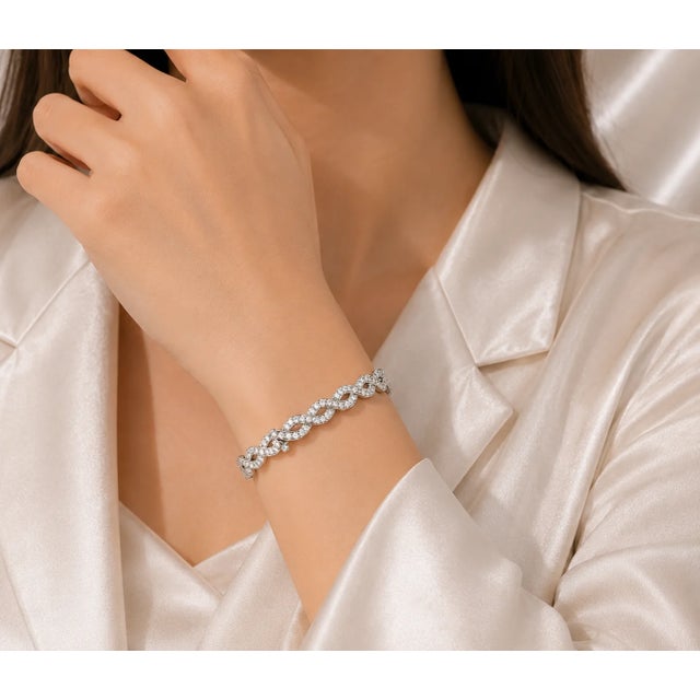 Contemporary Late 20th Century 14K White Gold Diamond Braided Tennis Twist Bracelet For Sale - Image 3 of 3