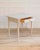 A charming 19th-century Swedish desk, crafted in pine and finished in a light, softly aged painted surface typical of...