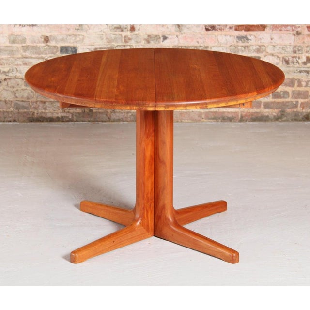 Mid Century Danish style extending solid teak dining table, circa 1970s. Extends to 158cm to seat up to 6 people....