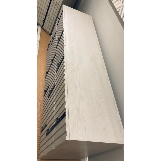 Original retail $3800, stylish Caracole Modern Taupe Clancy Dresser, slatted wood, black metal accents, showroom floor sample