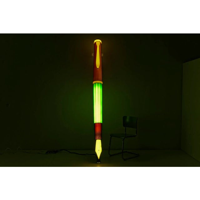 This monumental, illuminated window display by günther wagner from hanover advertises the successful model, the piston...