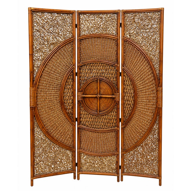 Make a bold design statement with this vintage dark rattan three-panel folding screen. Expertly handcrafted with intricate...