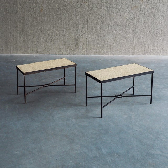 Pair of minimalist side tables that seamlessly combine clean architectural lines with rich organic texture. Each table...
