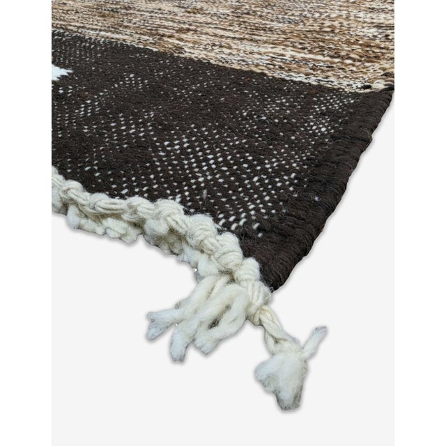 Boujad Rug | Handwoven Berber Flatwoven Rug with Cream Diamond Medallions This earthy Boujad rug features a richly...