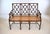 Faux bamboo bench settee with Tortoise shell lacquered finish, beautifully caned seat and custom leather down filled seat...