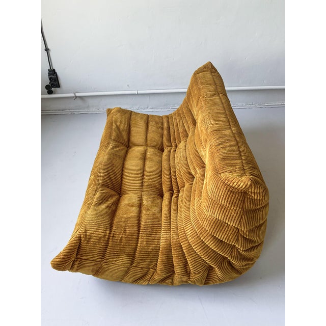 This Togo has been reupholstered with new foam and high-quality new fabric, keeping its inner structure giving the item...