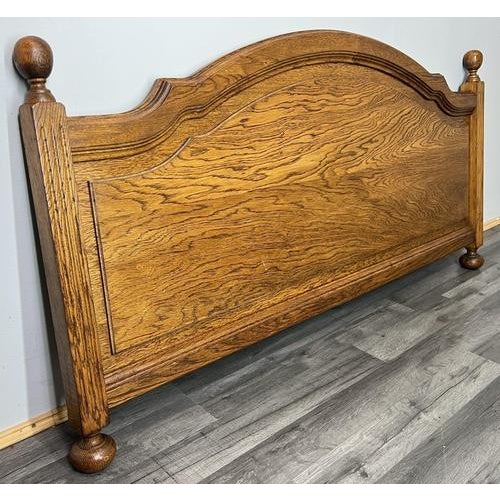 This Vintage French footboard presents a classic, well-balanced silhouette with softly curved lines and a warm, aged...