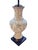 Dramatic vintage Asian-inspired table lamp featuring an elaborately detailed urn-form body worked in deep relief with an...