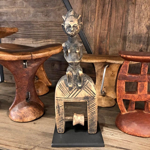 Vintage wood carved heddle pulley on iron stand. Unique small piece from West Africa great for collectors and special...