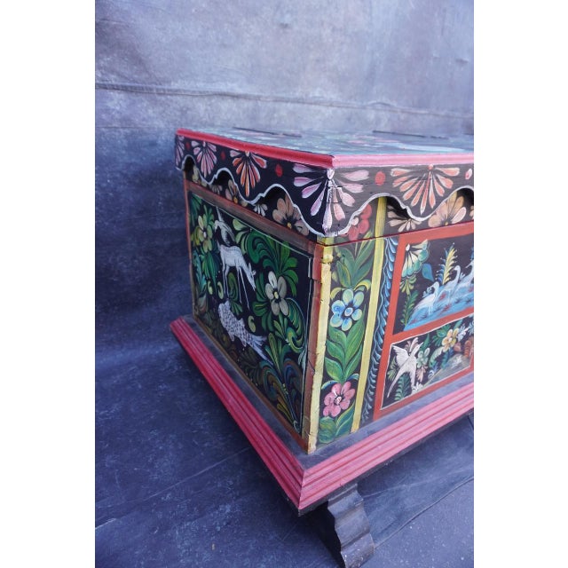 Beautiful and very large decorative Mexican trunk. Lovely hand-painted scenes depicting various animals in a classic...