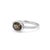 This elegant ring features a captivating Smoky Quartz gemstone, admired for its rich earthy-brown tones and subtle,...