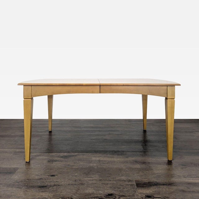Upgrade your dining space with this Ethan Allen 7-piece dining set. It features a sturdy light wood table with a smooth...