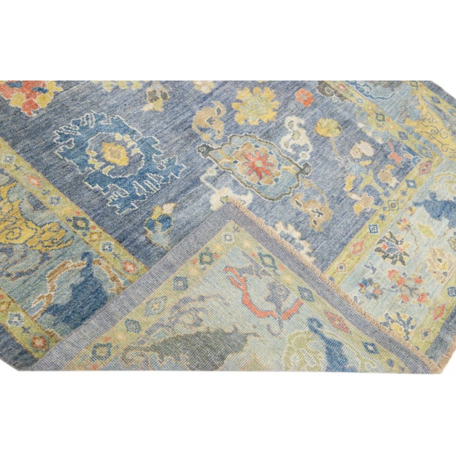 Beautiful modern Sultanabad hand-knotted wool rug with a gray color field. This rug has multicolor accents in a gorgeous...