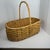This is a split wood gathering basket, likely dating from the 19th or early 20th century, historically used for harvesting...