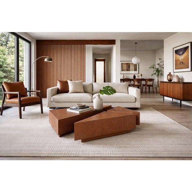 This striking vintage coffee table set, crafted in the United States circa 1970s, showcases a bold sculptural design...