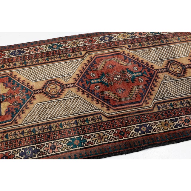 1950s Vintage Hand-Knotted Kurdish Long Runner Rug With Diamond Medallions in Terracotta, Camel, and Indigo For Sale - Image 5 of 9