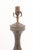 Produced by the Marbro Lamp Company in the 1950s, these towering bronze lamps are striking interpretations of an ancient...