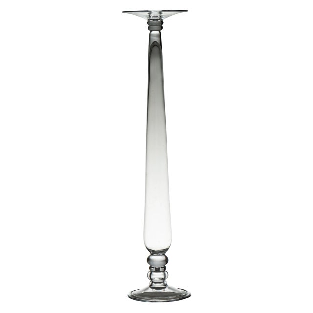 A nicely made candlestick of fine clear glass that accommodates a pillar candle. Simple and elegant.