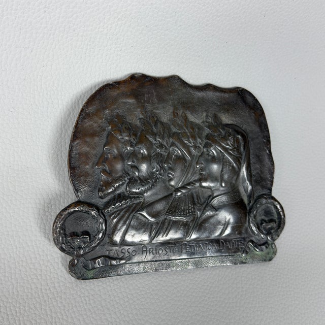 A striking decorative bronze wall plaque dating back to the 1940s/1950s. It is a celebratory object with a classic feel,...