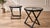 Elegant pair of Ralph Lauren Mercer Street occasional tables, featuring substantial black-finished mahogany X-frame bases...