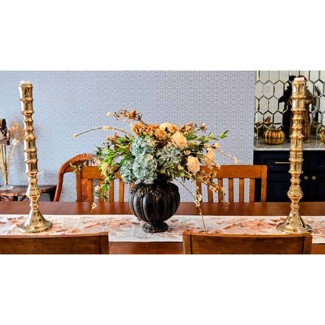Elevate your space with this stately pair of vintage brass altar candlesticks, crafted in an eye-catching bamboo motif....