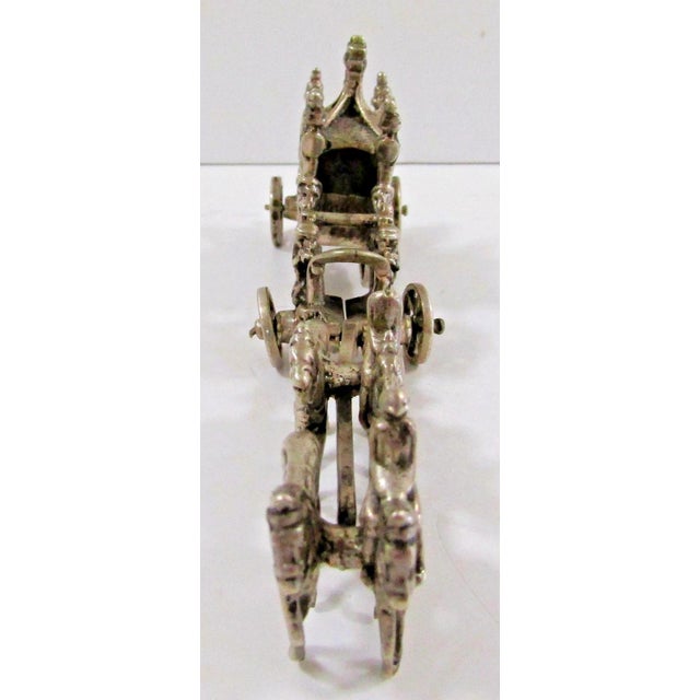 This 19th Century European 900 Silver 4 Horse Carriage with Soldiers and Trumpeters is a stunning antique piece that...