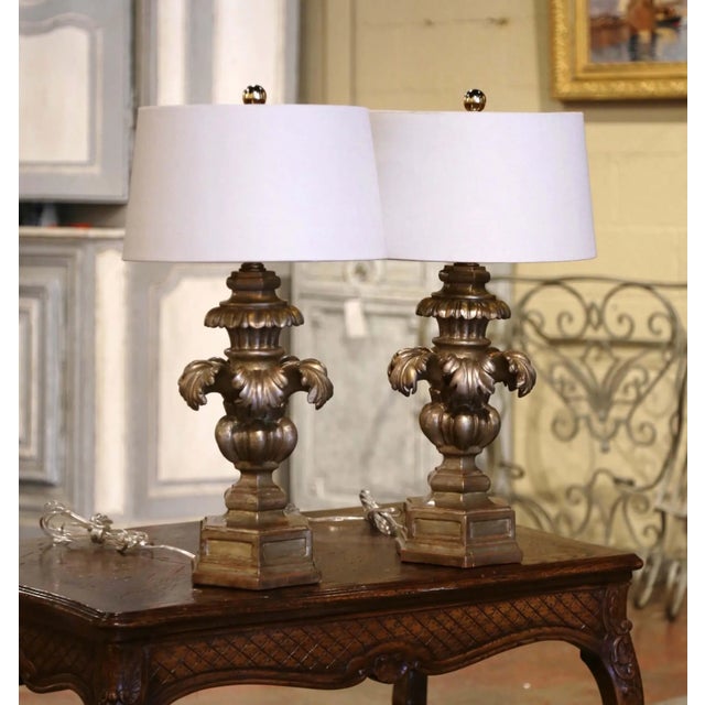 Decorate a pair of bedside tables or a console with these elegant antique-style table lamps. Crafted in Italy circa 1970,...