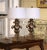 Decorate a pair of bedside tables or a console with these elegant antique-style table lamps. Crafted in Italy circa 1970,...