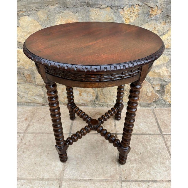 A beautifully proportioned piece featuring bobbin/barley twist turned legs, united by a cross stretcher for elegance and...