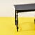 Discover the timeless elegance of this black wooden table, a charming example of vintage design. Its clean lines and...
