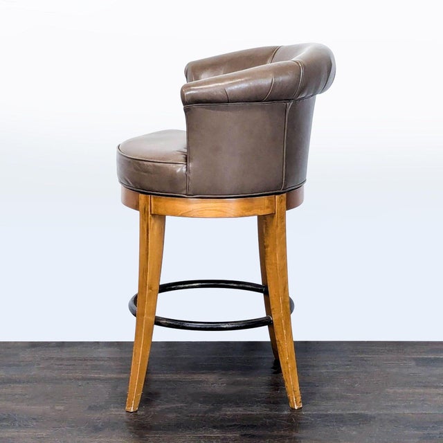 Modern Brown Leather Swivel Bar Stool With Wooden Legs and Footrest For Sale - Image 3 of 7
