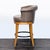 Modern Brown Leather Swivel Bar Stool With Wooden Legs and Footrest For Sale - Image 3 of 7