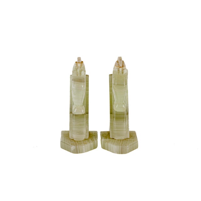 Vintage Mid-Century Modern Hand Carved Green Onyx Horse Head Bookends featuring a smooth, polished finish with natural...