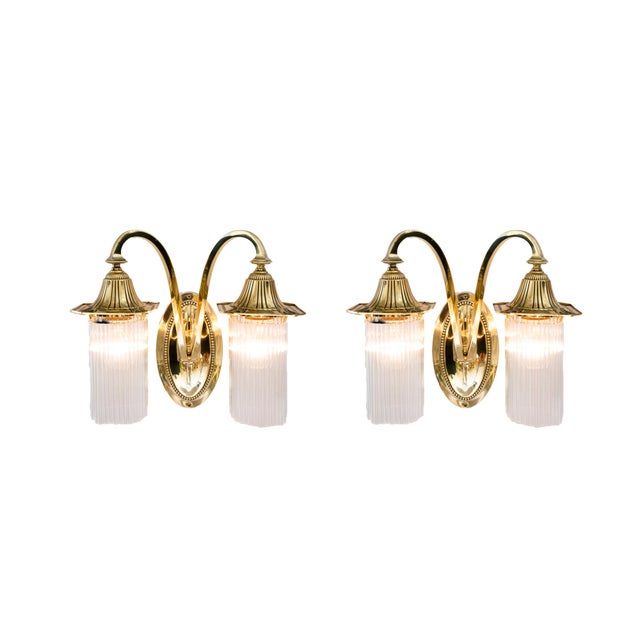 Brass polished and stove enameled The glass sticks are replaced ( new ) Up to 250V (Europe/UK Standard).The wiring of this...
