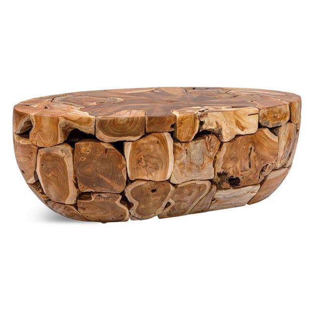 Organic modern oval teak root coffee table crafted from naturally formed teak root sections that showcase beautiful...
