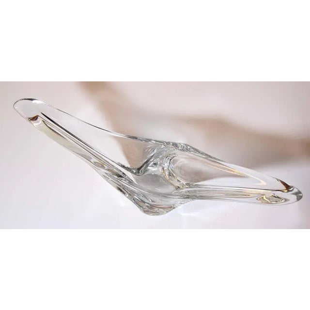 Sculptural curvilinear crystal art glass fruit bowl, model Aquarius 1960 signed. The midcentury bowl offers an oblong form...