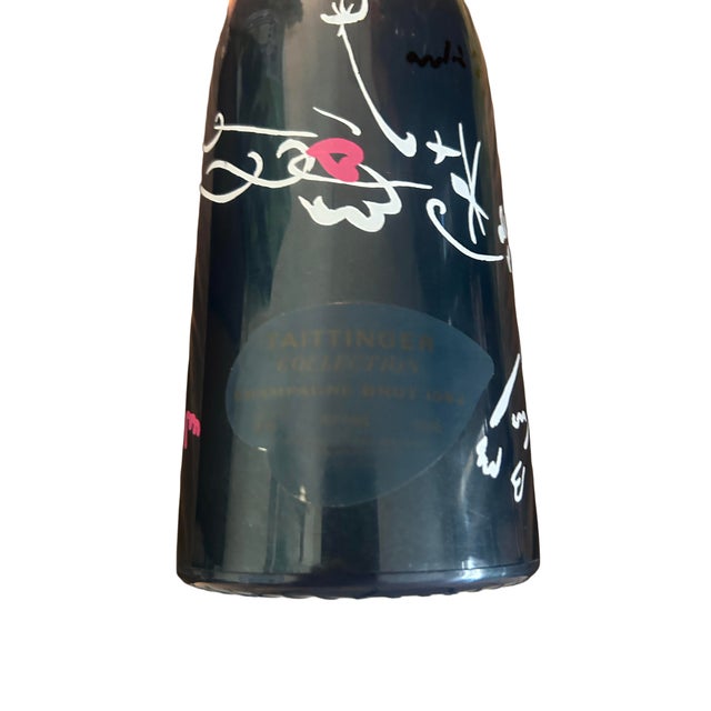 Vintage 1982 (exceptional year in Champagne) Taittinger Brut from their Artist Collection. In 1982 Taittinger featured a...