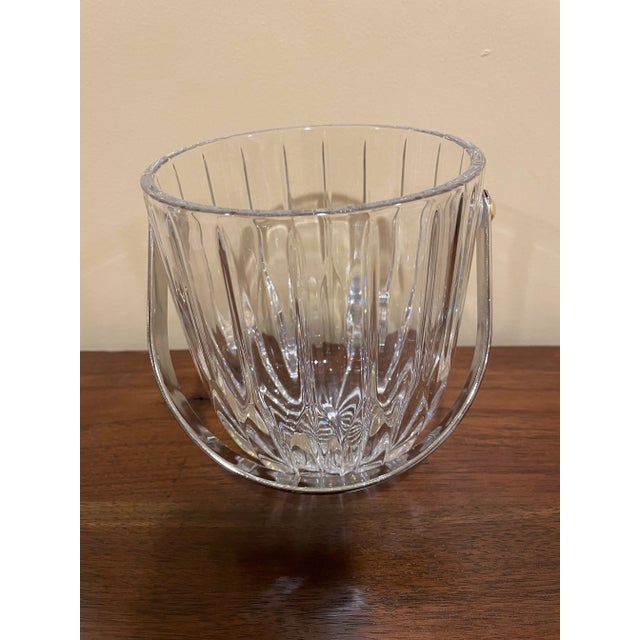 This delicate Mikasa crystal ice bucket with chrome handle is the perfect size for dinner and drinks for two, measuring...