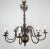 Antique dutch-style bronze chandelier from the late 19th century. The massive structure impresses with its honest...