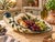 Beautiful Italian hand-painted ceramic serving dish featuring a richly detailed grapevine motif in deep purple, golden...