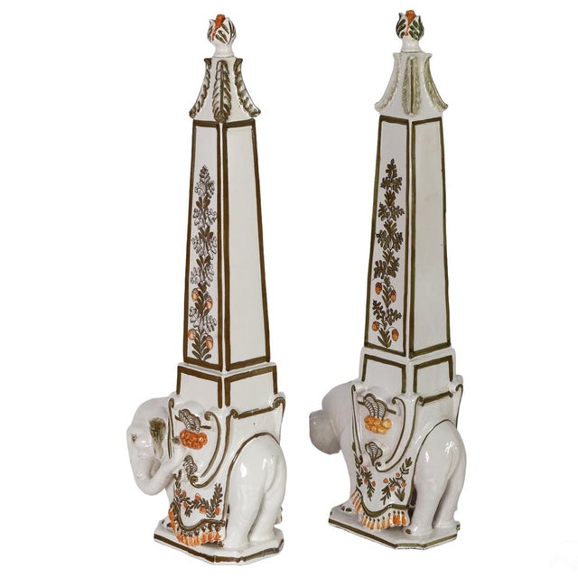 This is a wonderful pair of Elephant obelisk made in Italy. This is a real pair as they are opposing. The terra cotta...