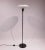 PH 3½-2½ floor lamp with frame of black metallic steel and brass designed by Poul Henningsen and manufactured Louis...