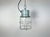 This Industrial hanging light was made by Elektrosvit in former Czechoslovakia during the 1970s. It features a cast...